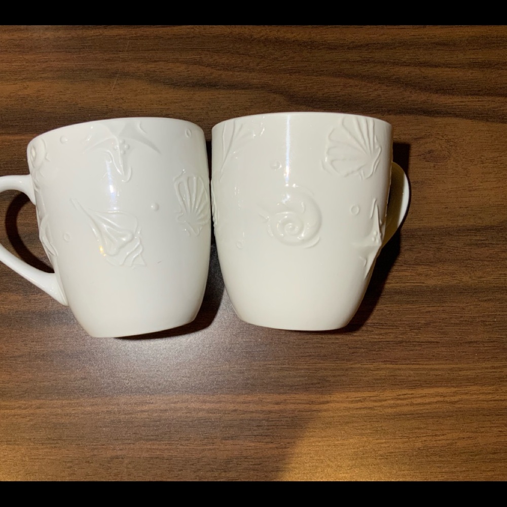 Set of two white beach ocean shell mugs subtle